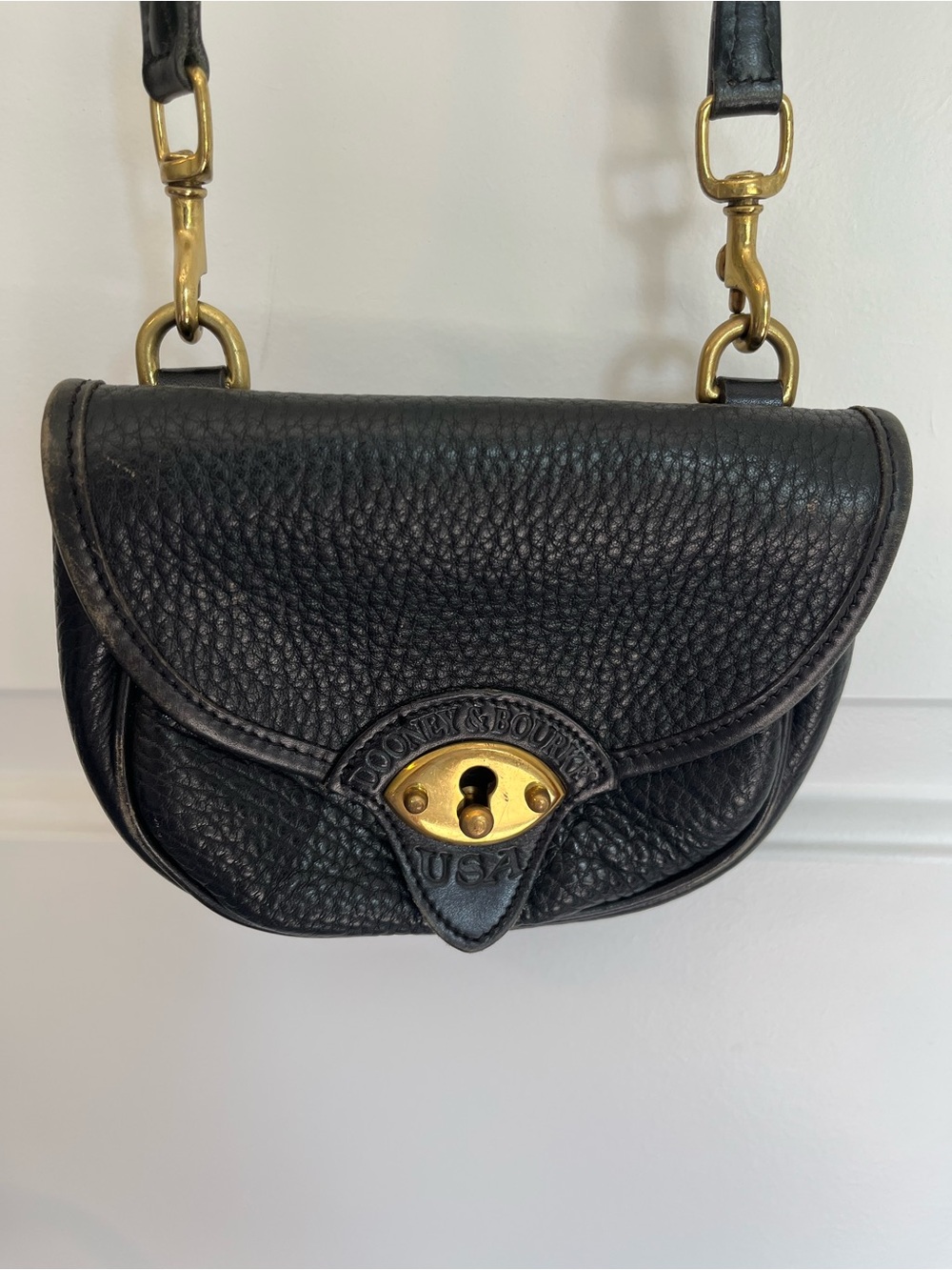 Dooney & Bourke Black Pebbled Leather Mini Saddle Crossbody with Gold Hardware